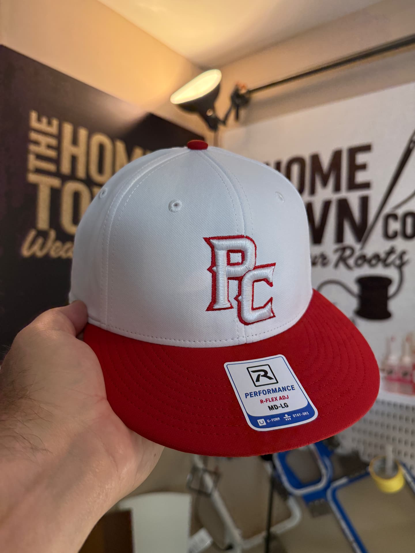 White and red performance cap with PC puff embroidered monogram
