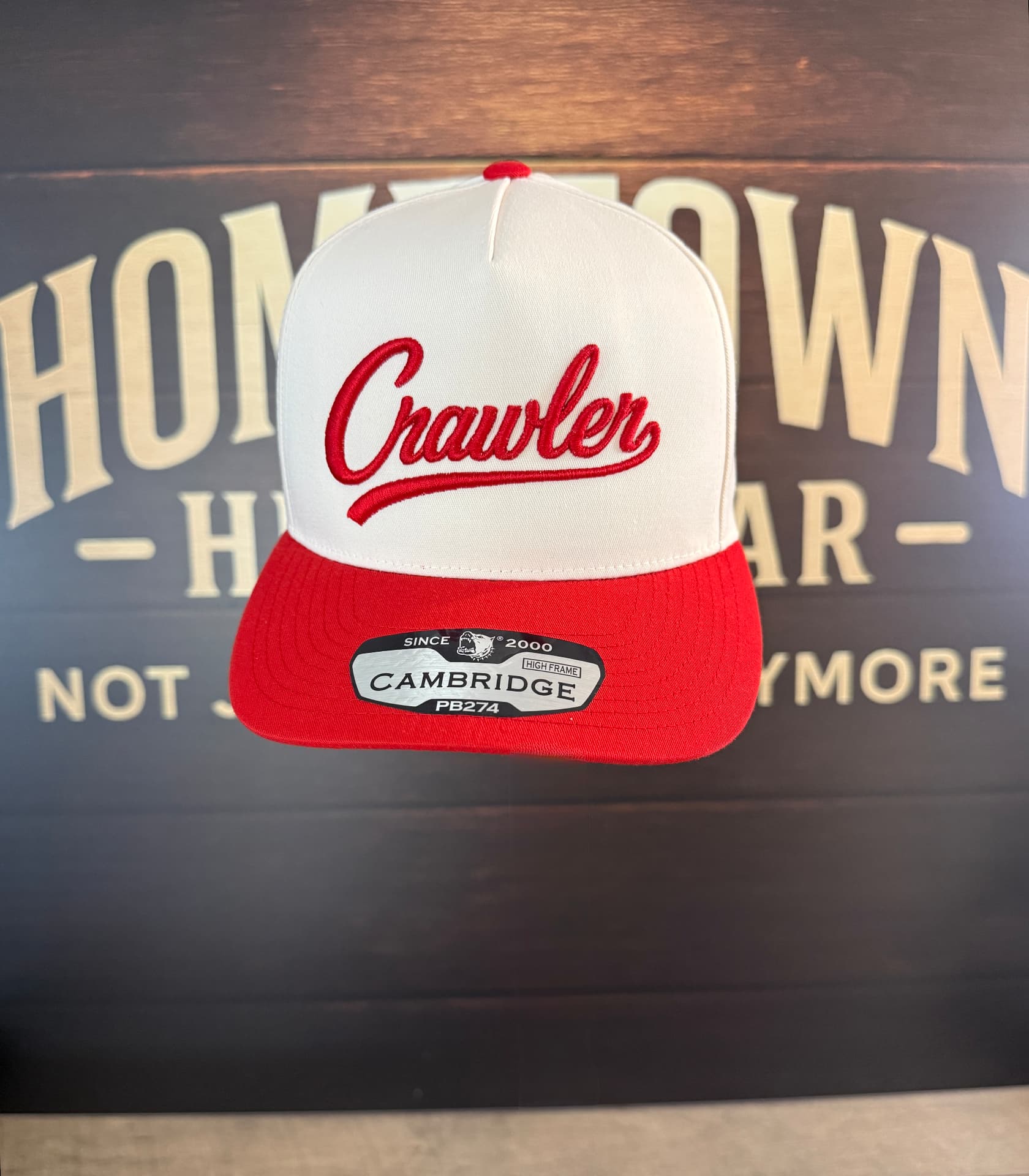 White and red snapback with 3D puff embroidered Crawler script