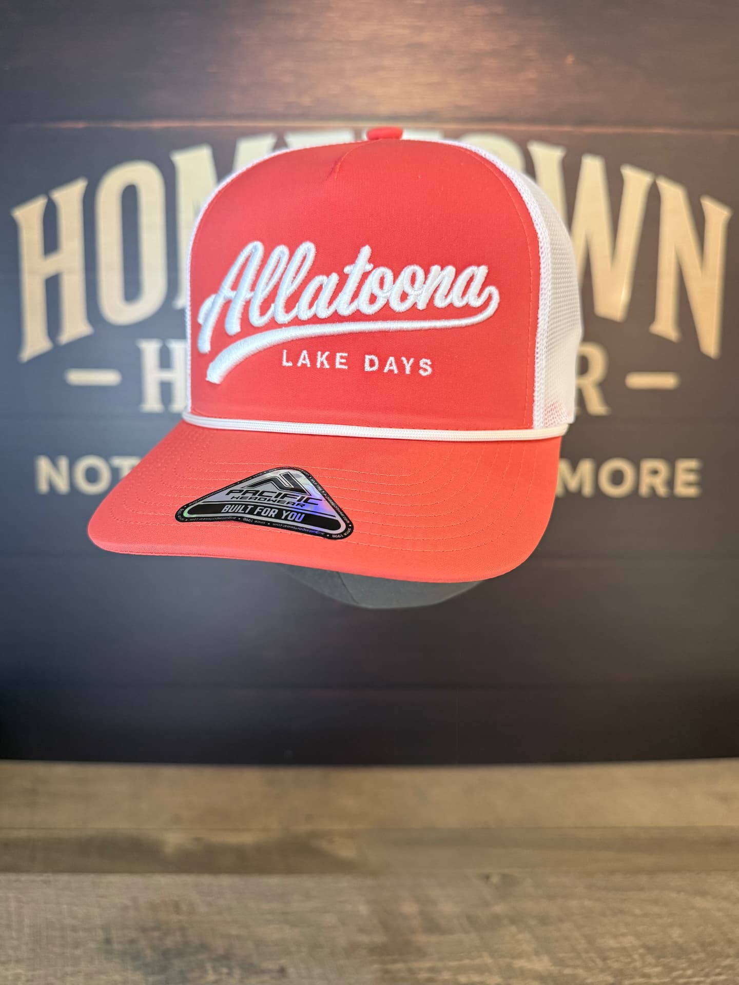 Red and white rope trucker hat with Allatoona Lake Days embroidery